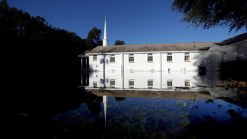 A church sits surrounded by water from Hurricane Matthew in Hollywood, S.C., Sunday, Oct. 9, 2016. (Image: AP)